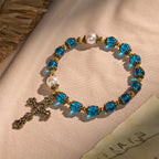 Christianartworkshop Spiritual Blue Gloss Bead Bracelets Featuring Sacred Brass Crucifix