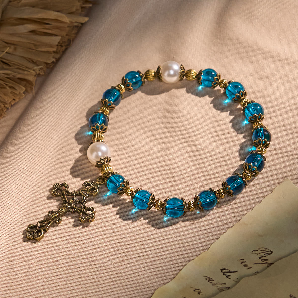 Christianartworkshop Spiritual Blue Gloss Bead Bracelets Featuring Sacred Brass Crucifix
