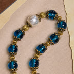 Christianartworkshop Spiritual Blue Gloss Bead Bracelets Featuring Sacred Brass Crucifix