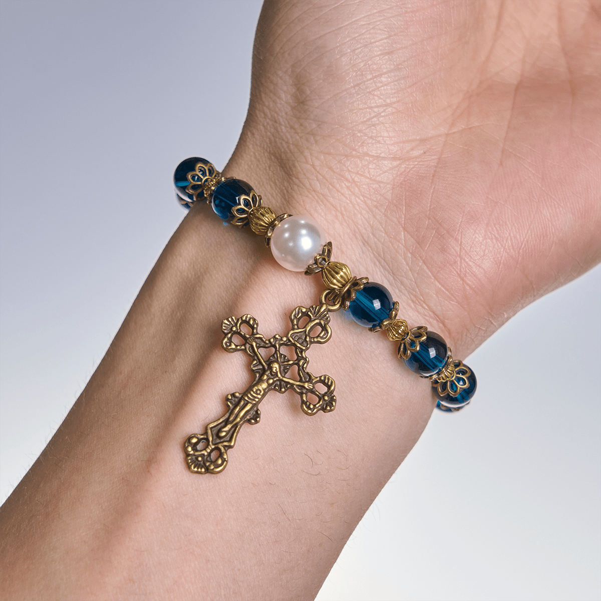 Christianartworkshop Spiritual Blue Gloss Bead Bracelets Featuring Sacred Brass Crucifix