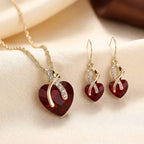 Fanny | Gold Ruby Twisted Heart Jewellery Set