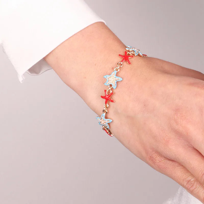 Metal bracelet with colored starfish