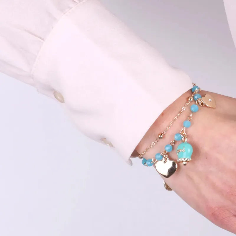 Metal Bracelet with Blue Enamel Bell and Dangling Hearts