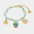 Metal Bracelet with Blue Enamel Bell and Dangling Hearts