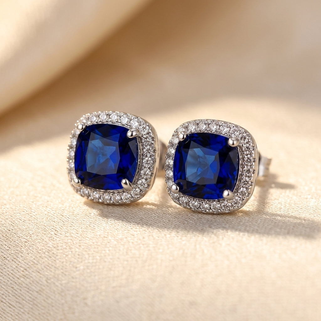 Estée | Silver Sapphire Halo Studs