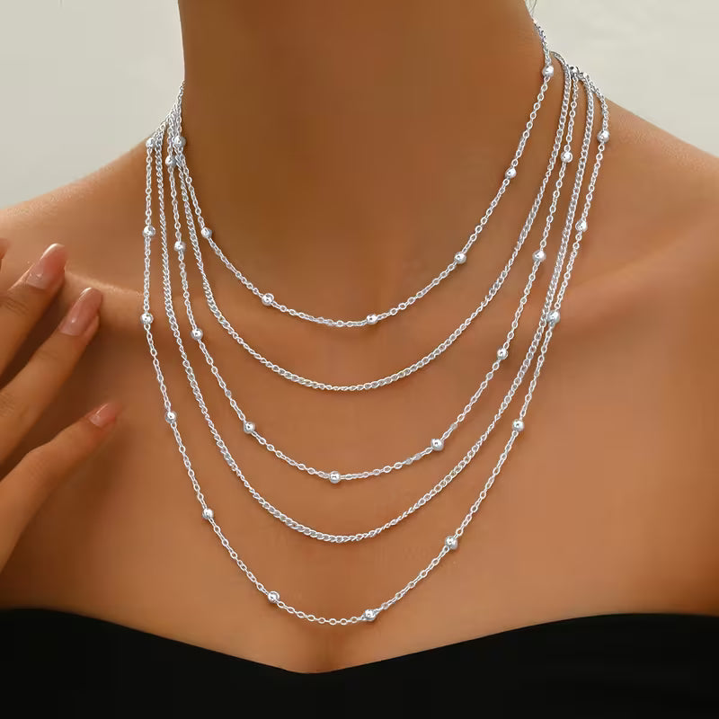 Elegant multi-strand necklace with tassels
