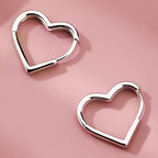 Heart-shaped earrings in stainless steel with gold finish