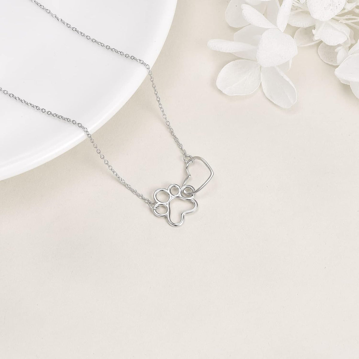Paw Print Necklace in Sterling Silver