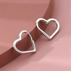 Heart-shaped earrings in stainless steel with gold finish