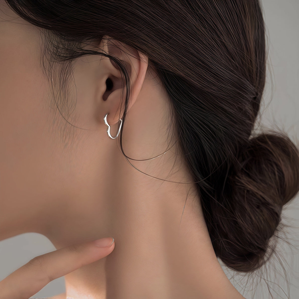 Heart-shaped earrings in stainless steel with gold finish