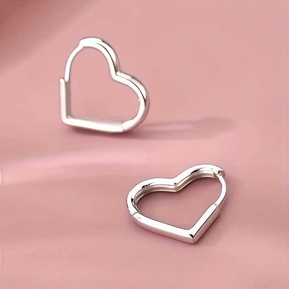 Heart-shaped earrings in stainless steel with gold finish