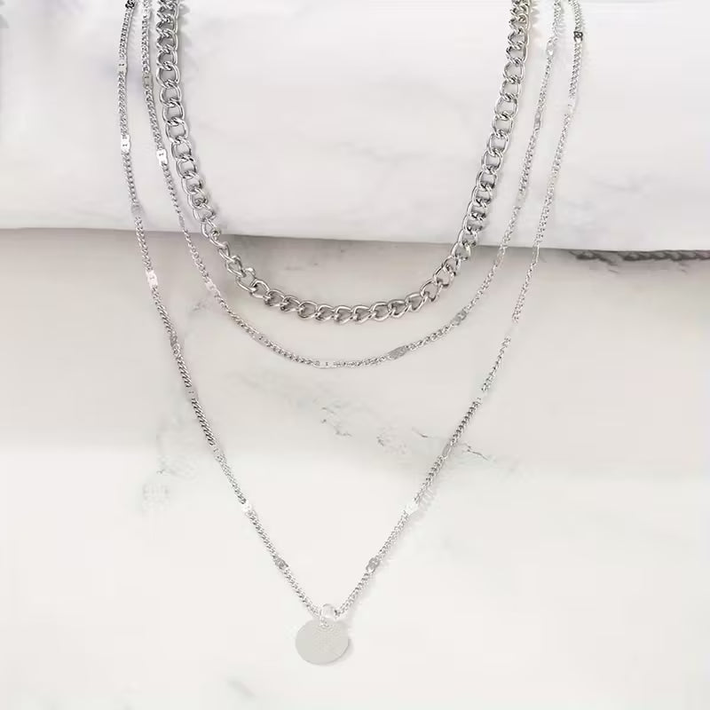 Elegant multi-layered necklace with round pendant