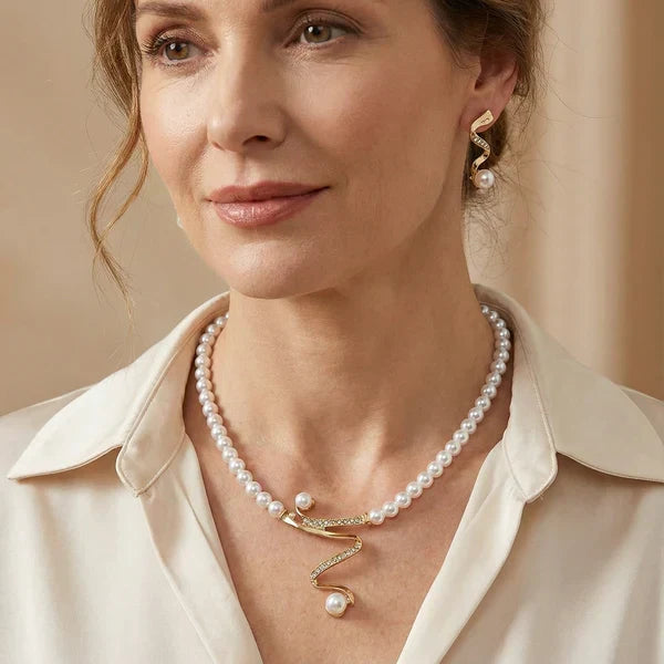 Set of a Necklace and Earrings with Natural Pearls