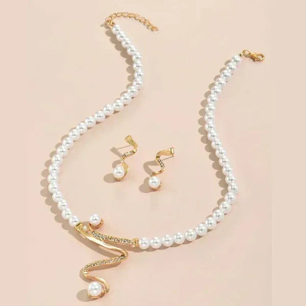 Set of a Necklace and Earrings with Natural Pearls