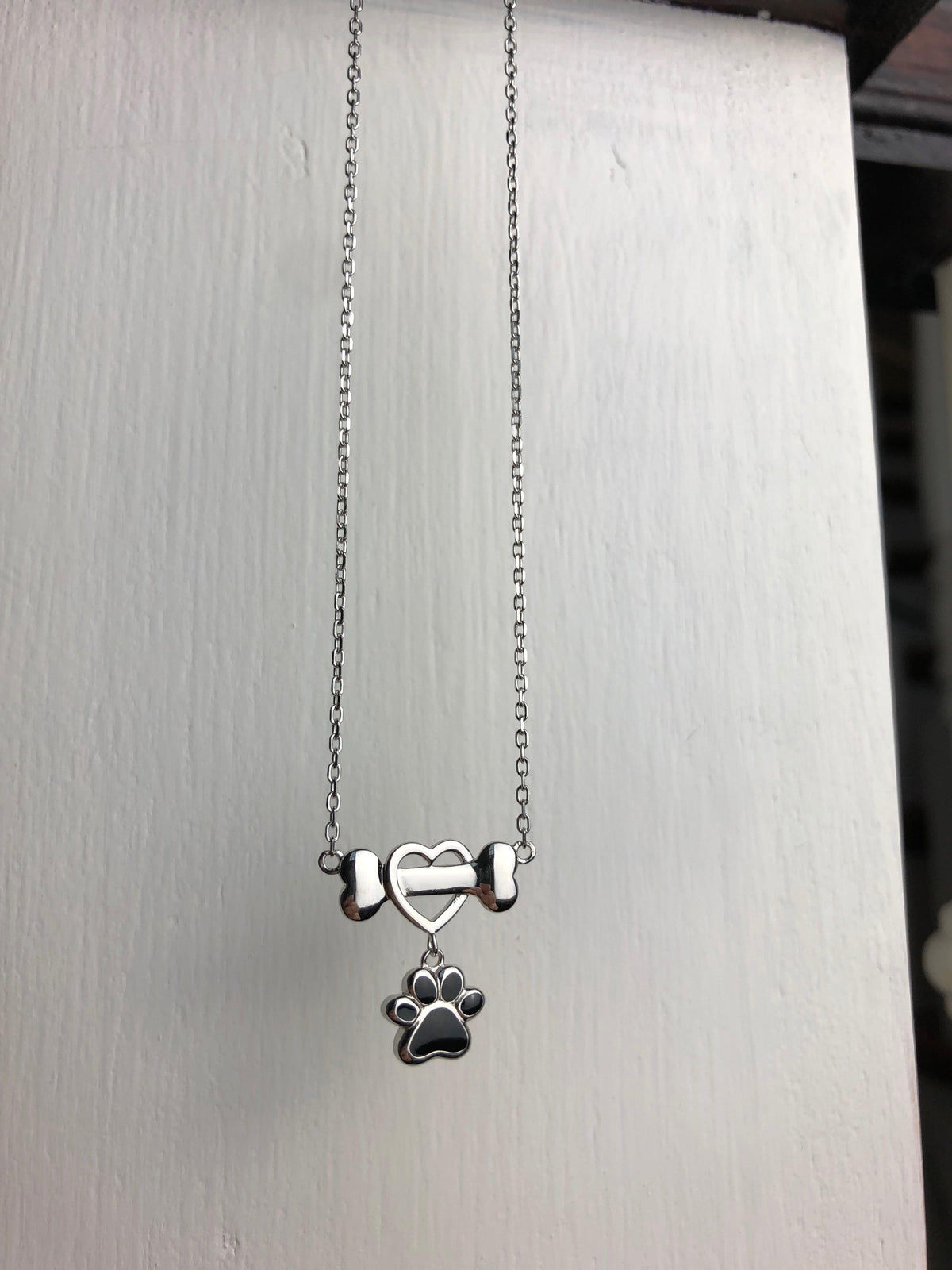 Delicate Dog Paw Necklace in Stainless Steel