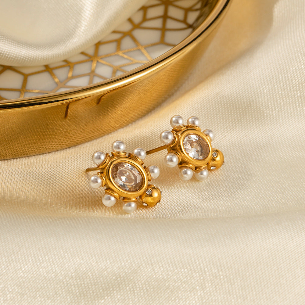 Elegant gold earrings with pearl