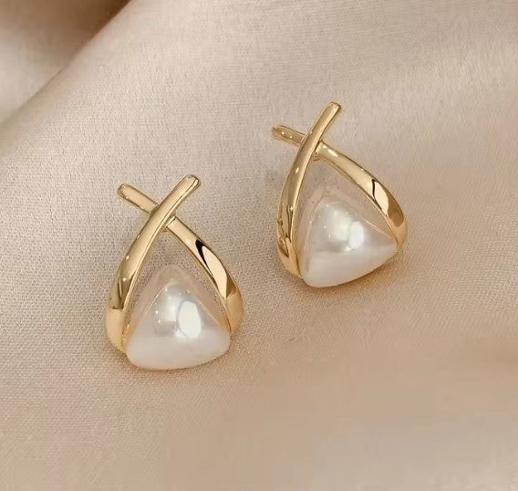 Vintage teardrop earrings with cross and triangular beads