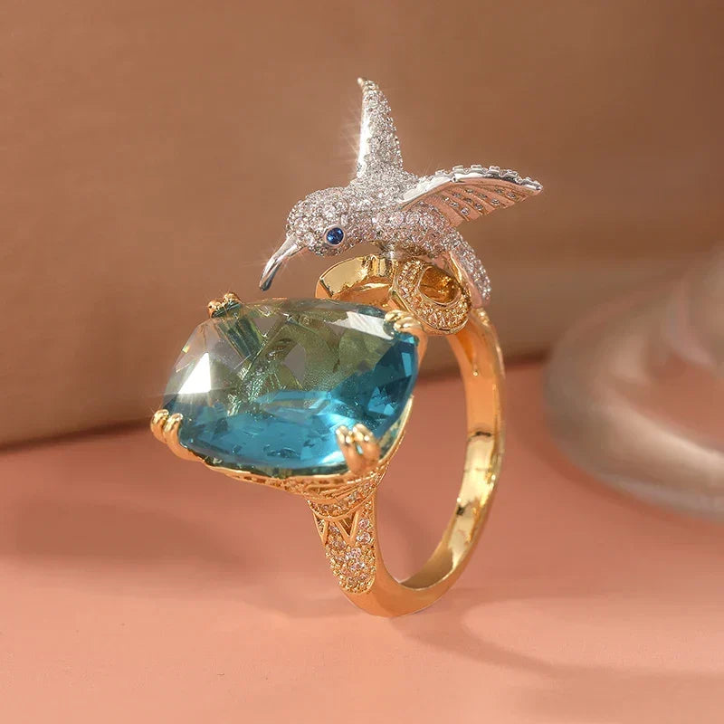 Adjustable Aquamarine-Coloured Hummingbird Ring