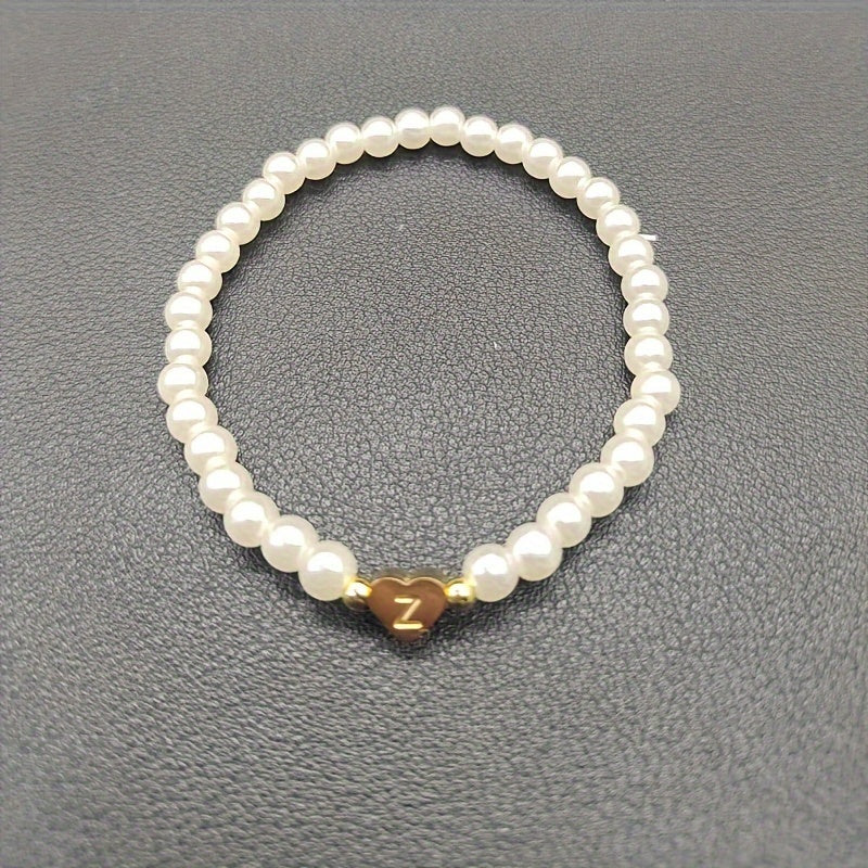 Ursa | Personalised Pearl Bead Bracelet with Heart Initial Charm