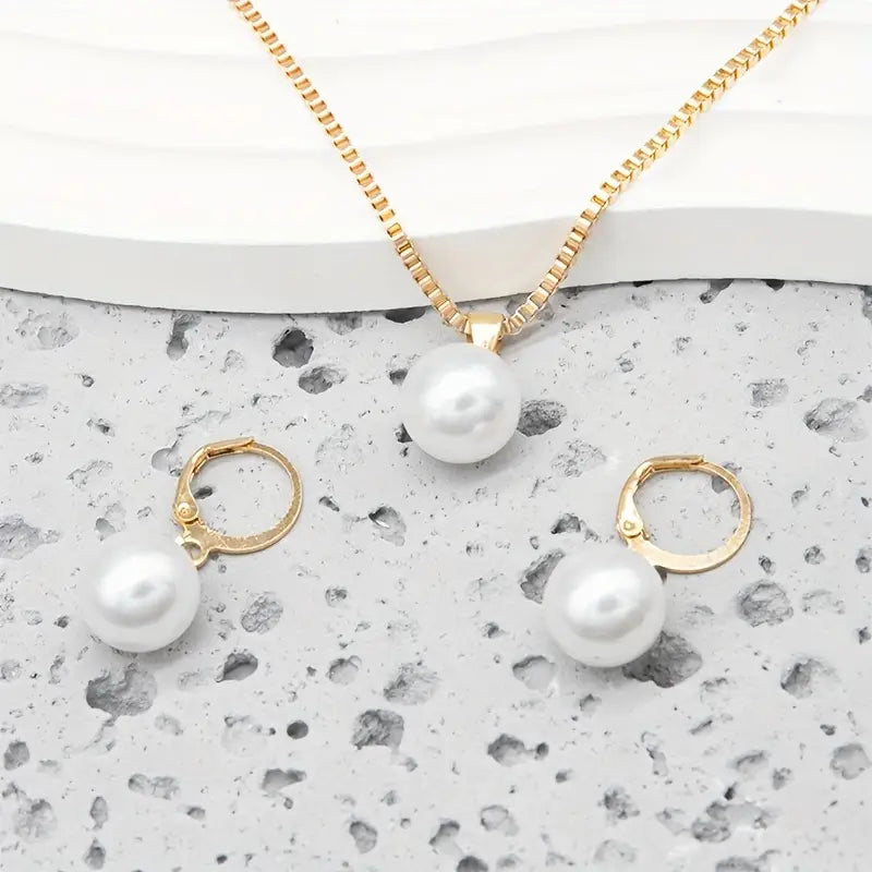 Delphinia | Gold Pearl Jewellery Set