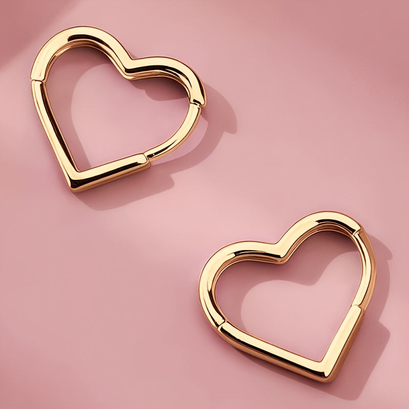 Heart-shaped earrings in stainless steel with gold finish