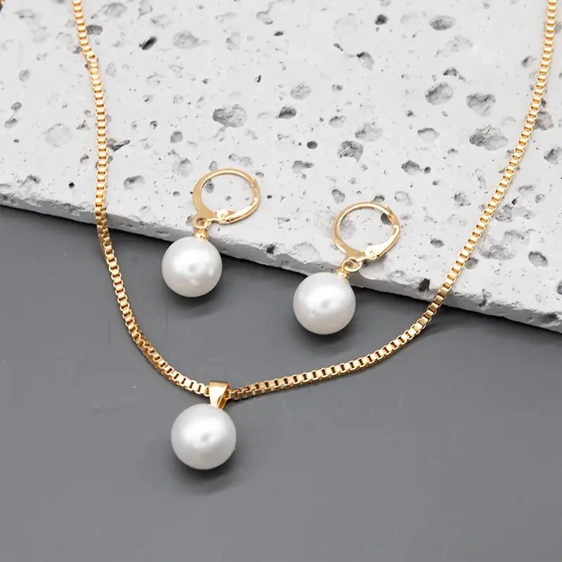 Delphinia | Gold Pearl Jewellery Set