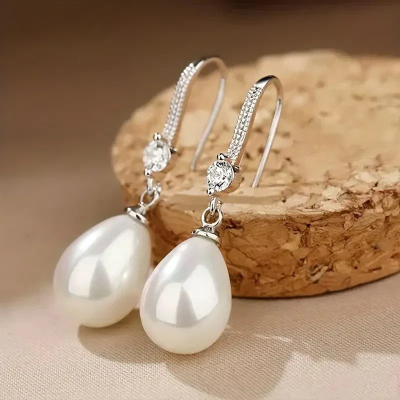 Halcyon | Dangling Earrings with Bright Pearls